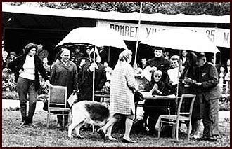 right A.Mazover third of it to the left (standing under an umbrella) E.Rozenberg